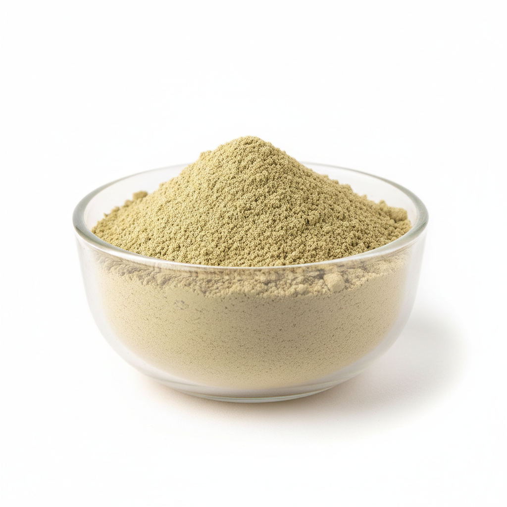 Amla powder in a clear glass bowl
