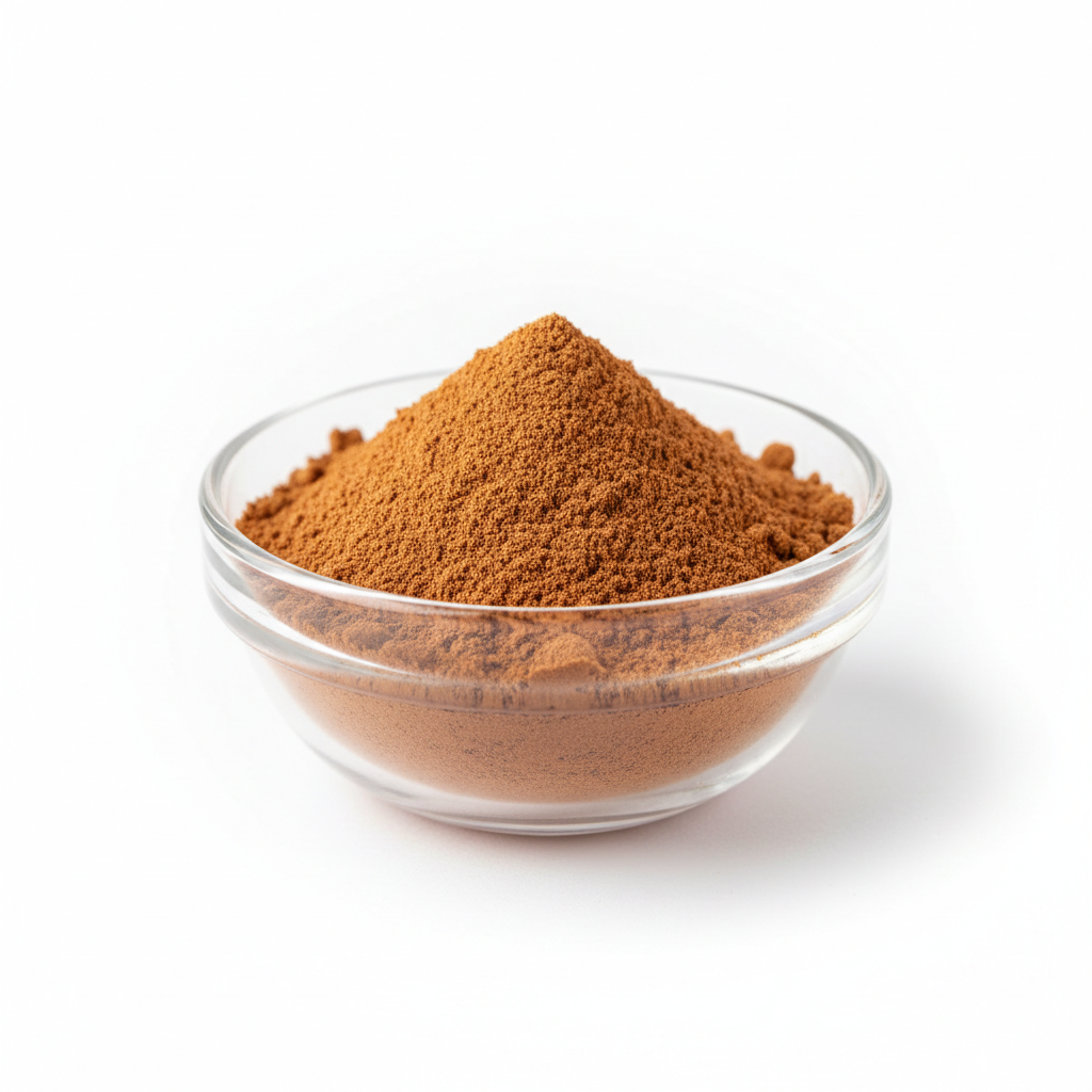 Cinnamon powder in a clear glass bowl