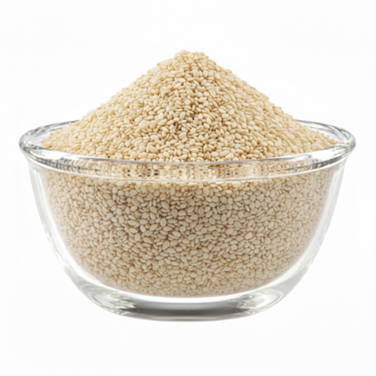 White sesame seeds tightly packed in the exact glass bowl